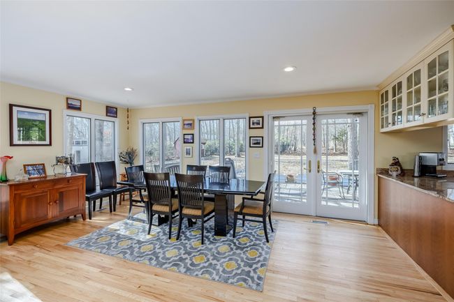 Dining space featuring visible vents, recessed lighting, french doors, and light wood-style floors | Image 19