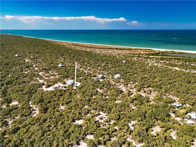 Birds eye view of property with a view of the beach and a water view | Image 8