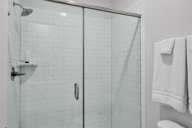 Bathroom featuring walk in shower | Image 34