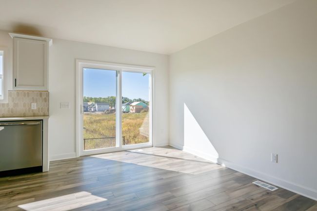 (*Photo of actual home) This home offers a informal dining room located just off the kitchen and full of beautiful natural sunlight | Image 5