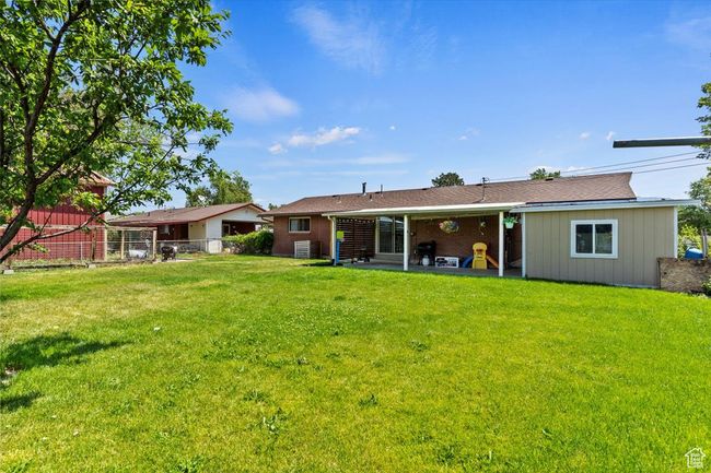 Back of house with a patio | Image 25