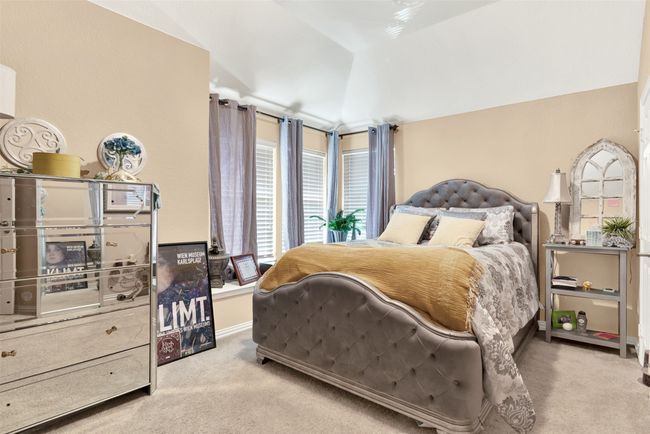 Bedroom 2 enjoys soft carpeting, sunny windows, and jack-n-jill bath. | Image 20