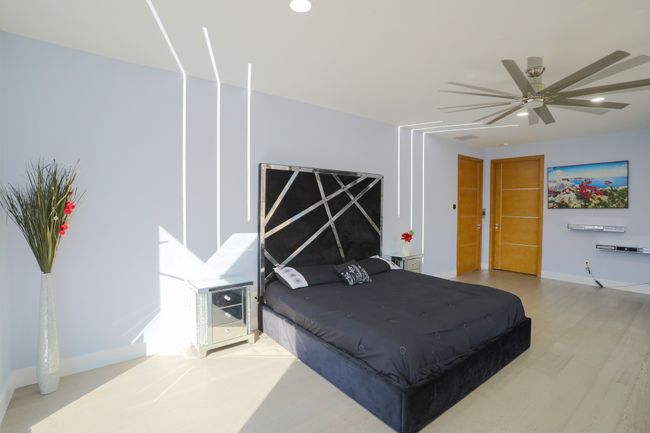 Bedroom with ceiling fan and light hardwood / wood-style flooring | Image 14