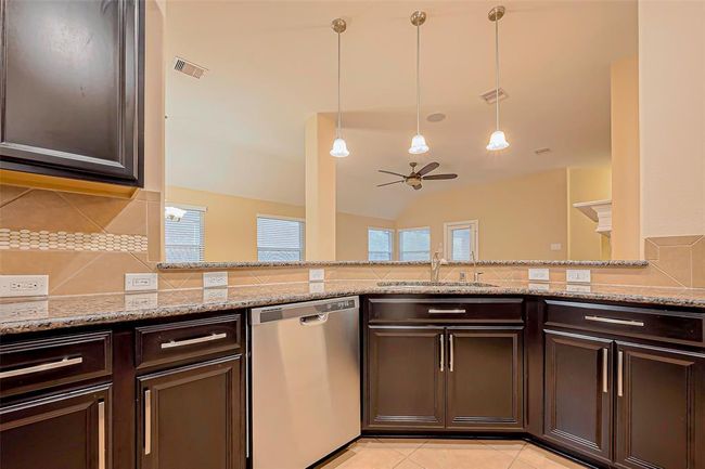 4914 Woodbury Mill Dr, House other with 4 bedrooms, 2 bathrooms and 2 parking in Spring TX | Image 4