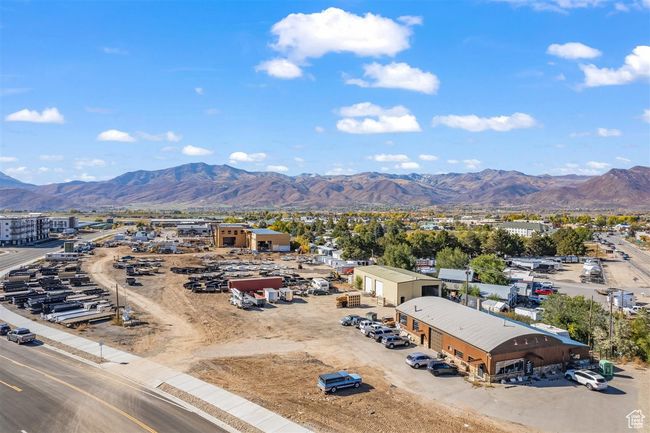 Birds eye view of property with a mountain view | Image 9