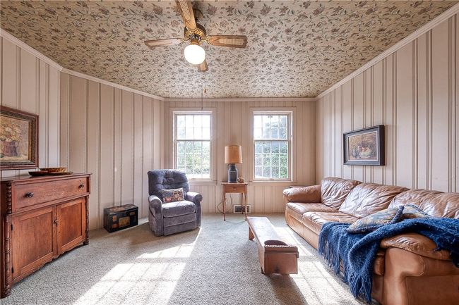 1st Floor family room area that has a powder room and also leads in to the eat in kitchen | Image 10