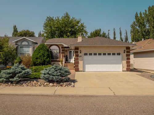 66 Heritage Road W, House with 3 bedrooms, 3 bathrooms and 4 parking in Lethbridge AB | Card Image