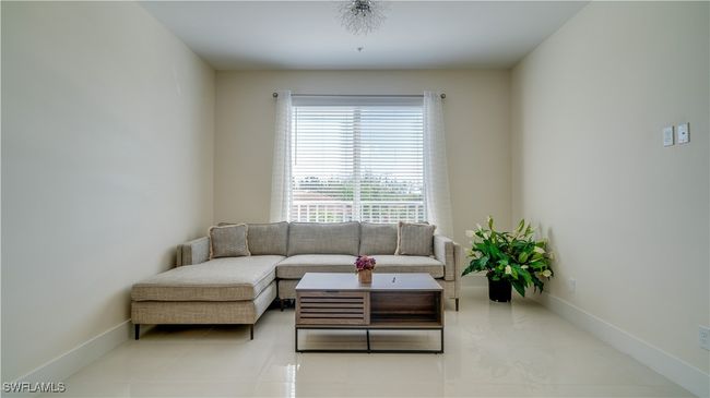 View of tiled living room | Image 15