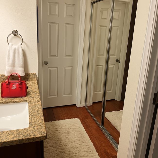 Bathroom with wood finished floors and vanity | Image 8