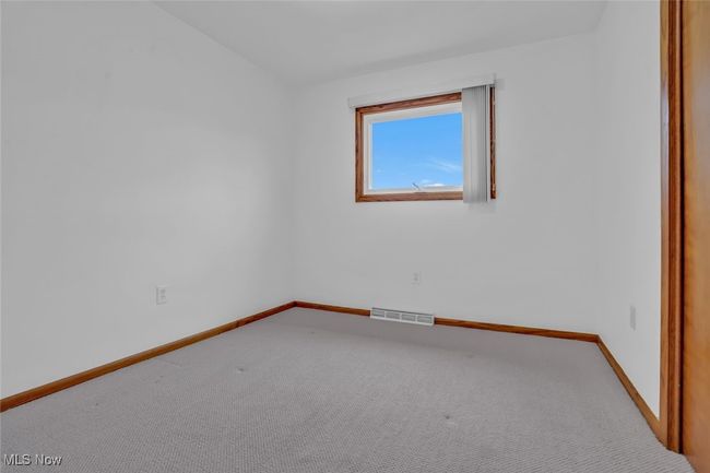 Spare room with carpet floors and baseboards | Image 20