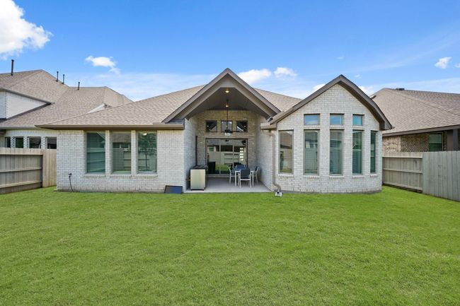 Step into the backyard oasis, with alarge covered patio, creating aninviting outdoor retreat. | Image 34