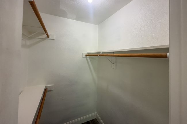 View of spacious closet | Image 8