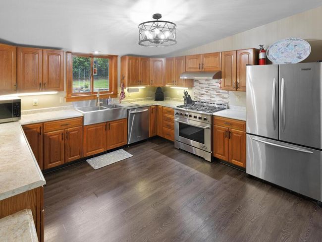 Another view of kitchen with SS appliances | Image 24