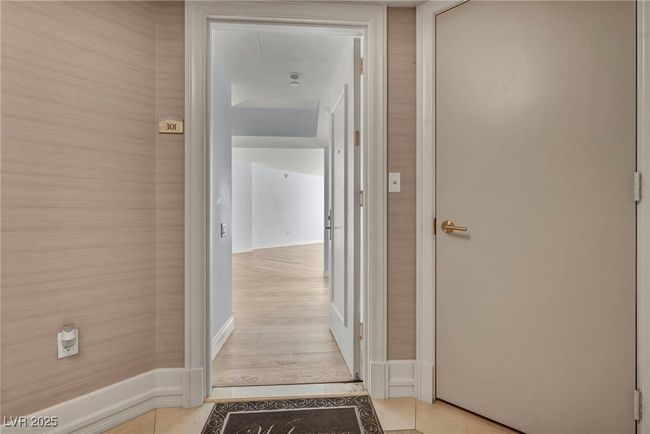 Corridor with view into condo | Image 4