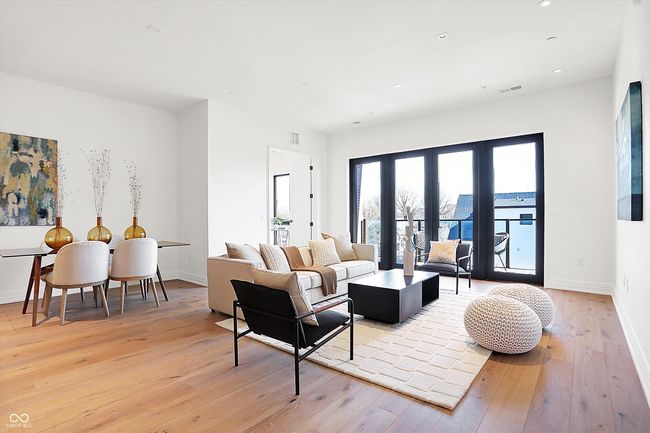 Spacious living area with 8ft window/door system which opens to your own private outdoor space and allows for natural light and great views | Image 13