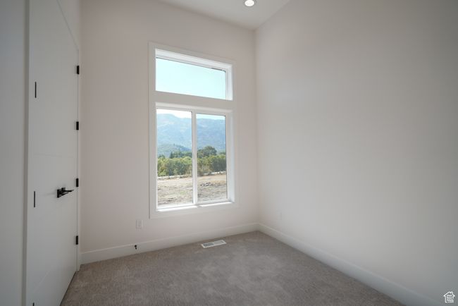 Carpeted empty room with baseboards and recessed lighting | Image 15