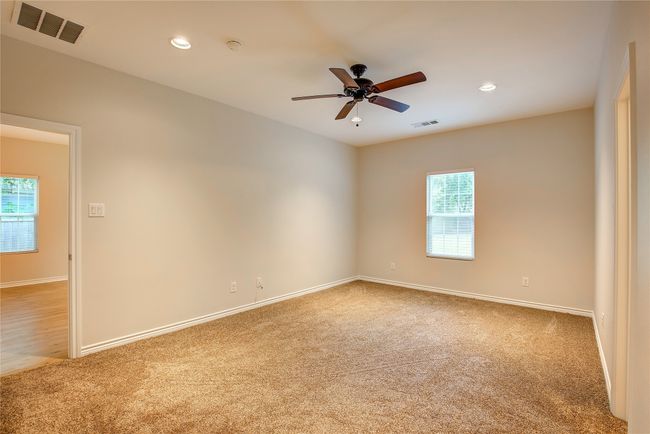 Spare room with carpet flooring, healthy amount of natural light, ceiling fan, and recessed lighting | Image 18