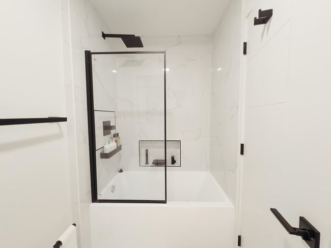 Full bathroom featuring bathtub / shower combination | Image 24
