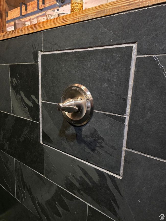 Room details featuring a tile shower | Image 77