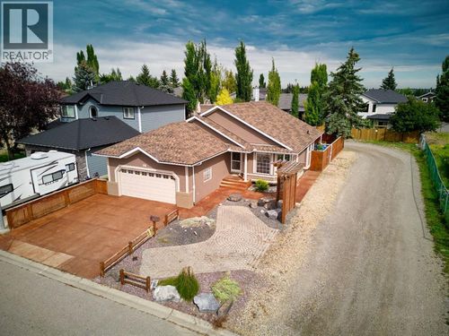 81 Sundown Manor Se, Calgary, AB, T2X3H7 | Card Image
