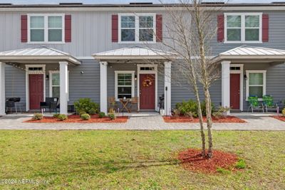 86832 Mainline Road Road, Townhouse with 2 bedrooms, 2 bathrooms and null parking in Yulee FL | Image 1