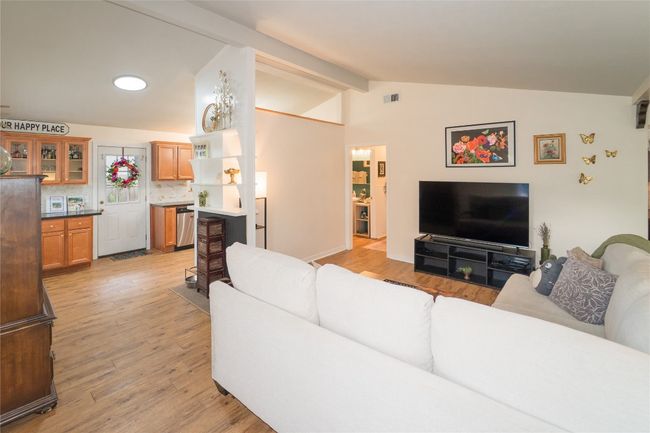 Living room featuring light w baseboards | Image 14