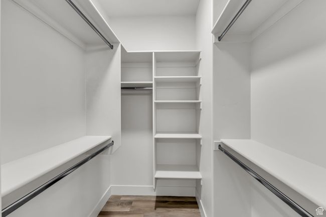 Spacious closet featuring hardwood / wood-style flooring | Image 22