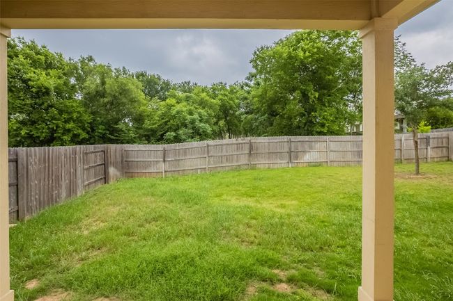 View of yard featuring a fenced backyard | Image 30