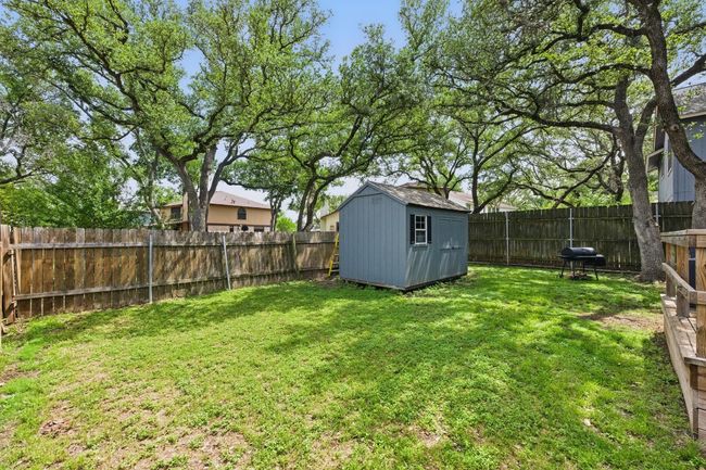 Recent landscaping and a freshly painted storage shed ensure both beauty and functionality in the backyard. Schedule a showing today! | Image 31