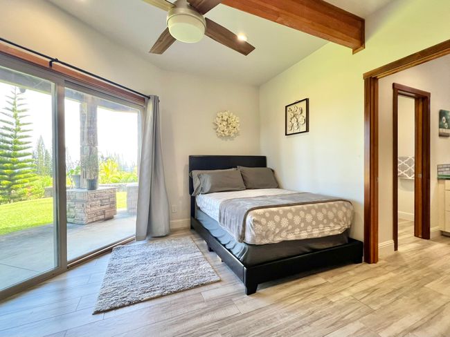 Guest bedroom downstairs opens to nature | Image 18