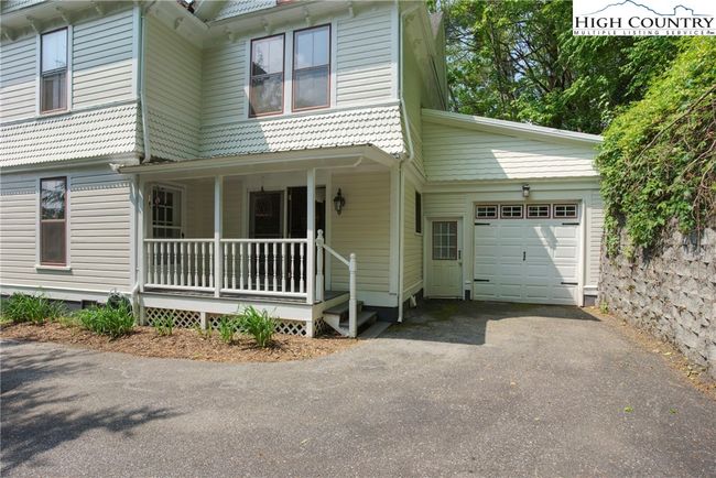 One car garage off the kitchen and small back porch. | Image 38