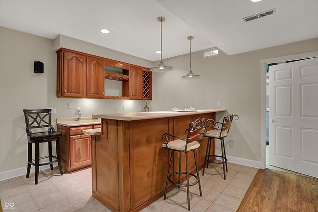 Wet Bar with Mini Fridge. | Image 52