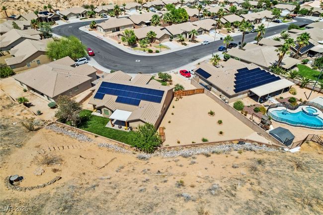 Aerial view of residential area featuring a pool | Image 45