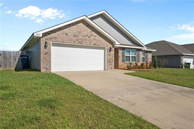 View of front facade featuring a garage and a front lawn | Image 3