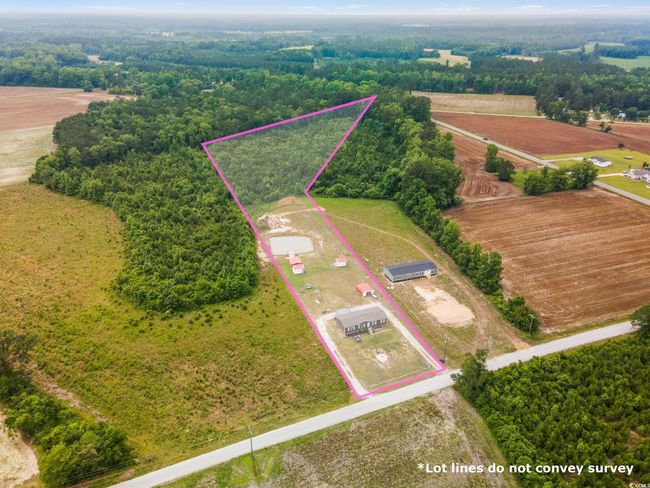Overview of rural landscape featuring property parcel outlined | Image 7