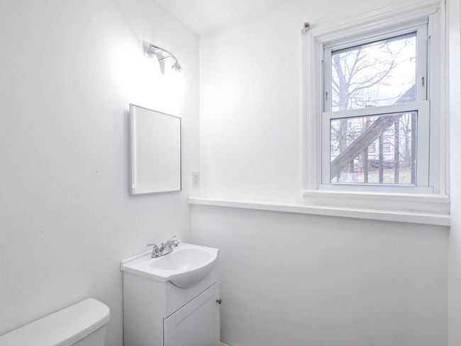 Bathroom with vanity and toilet | Image 21