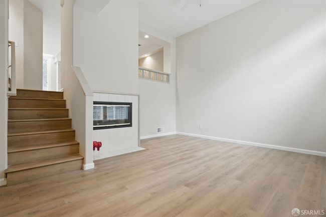 Spacious living room with gas fireplace | Image 7