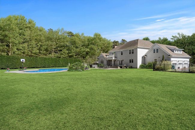 View of yard featuring fence and a fenced in pool | Image 42