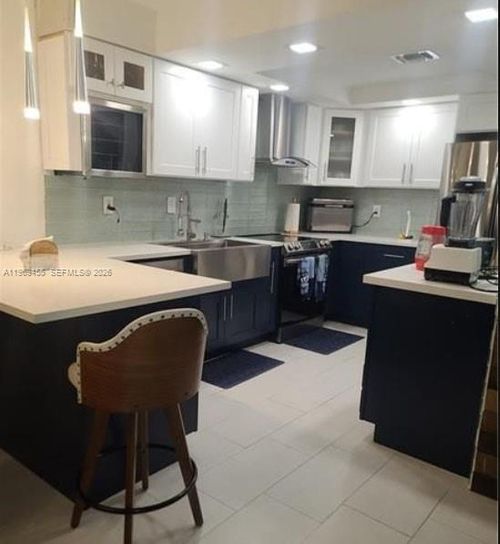 39-39 Ann Lee Ln, Tamarac, FL, 33319-2464 | Card Image