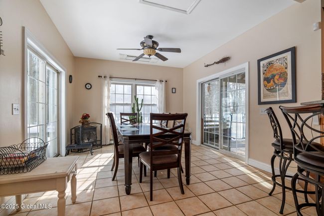Breakfast Nook with 2 sets of sliding doors to back yard | Image 9