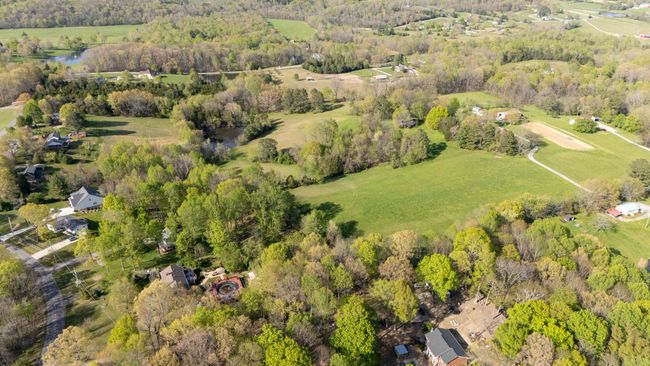 View of property from N. Leath Road Side. NOTE: Aerial Views Show Adjoining Properties Not Included in Sale | Image 8