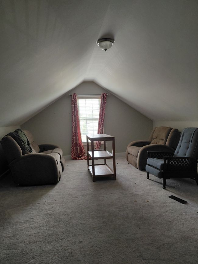 Bonus room upstairs with lots of storage. | Image 10
