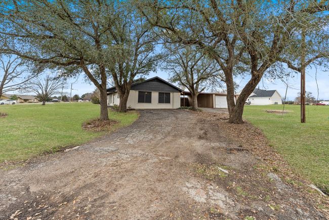View of front of home featuring a front yard | Image 26