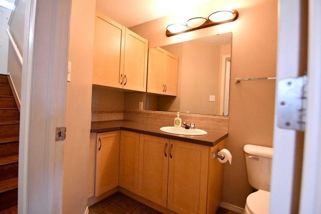 49 Prairie Ridge Close, Townhouse with 2 bedrooms, 2 bathrooms and 3 parking in Blackfalds AB | Image 20