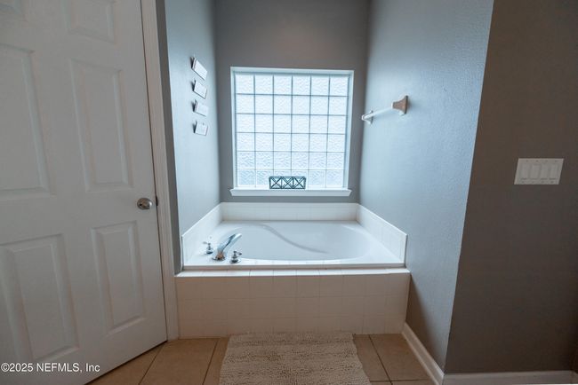 11760 Huckleberry Trl E, House other with 4 bedrooms, 2 bathrooms and null parking in MACCLENNY FL | Image 21