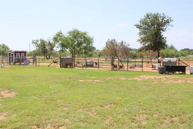 View of yard featuring an outbuilding | Image 18
