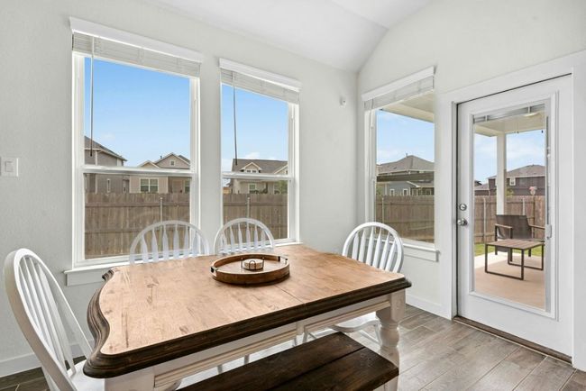Plenty of windows provide warm and natural light | Image 10