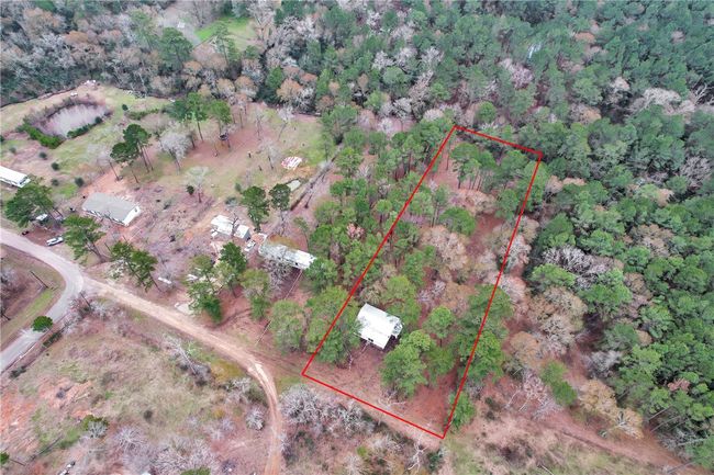 Aerial view of property and surrounding area with property parcel outlined | Image 33