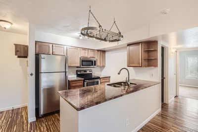 306 - 6425 S Dayton Street, Condo with 2 bedrooms, 1 bathrooms and 1 parking in Englewood CO | Image 1