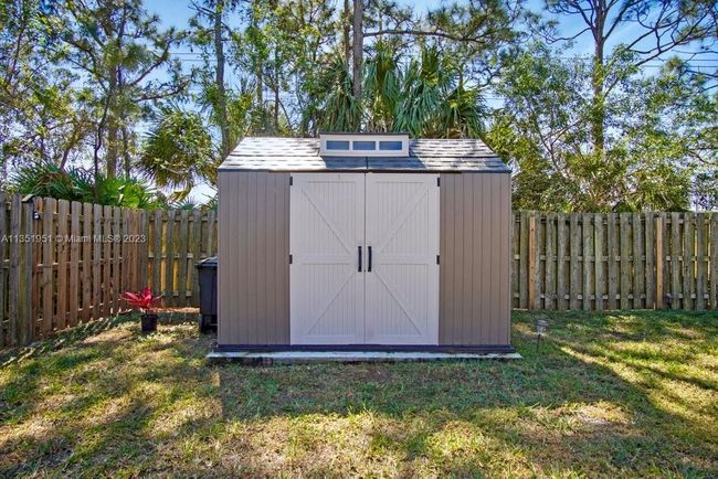 5806 Nw Breezy Brook Ct, House other with 3 bedrooms, 2 bathrooms and null parking in Port St. Lucie FL | Image 34
